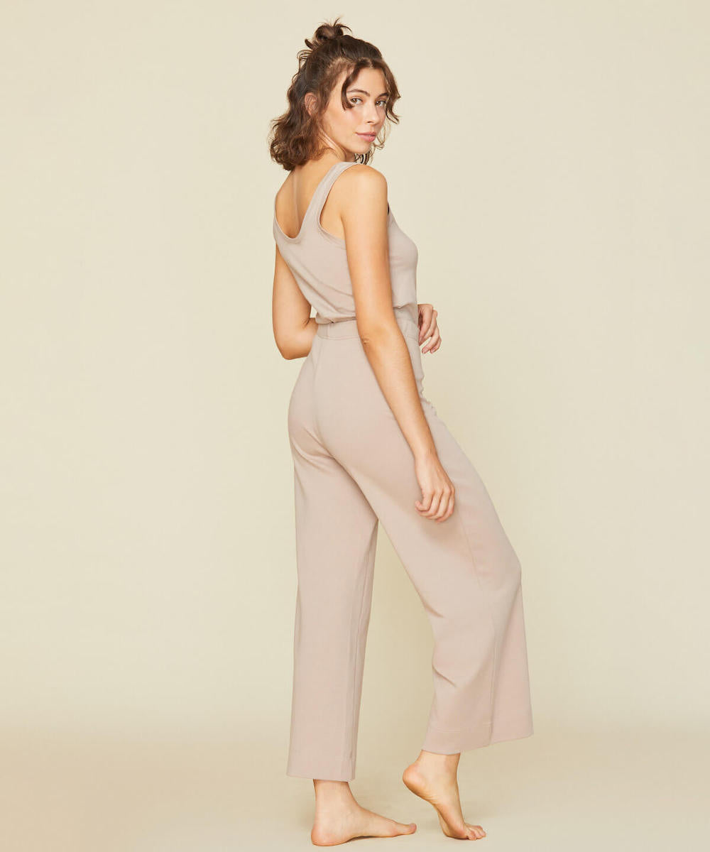 Woman wearing the essential robe in stone beige color
