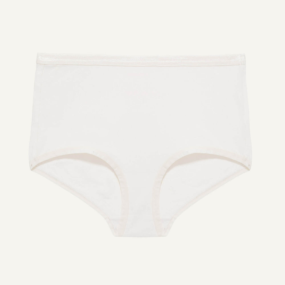 A mid rise retro brief in cloud nine white color.